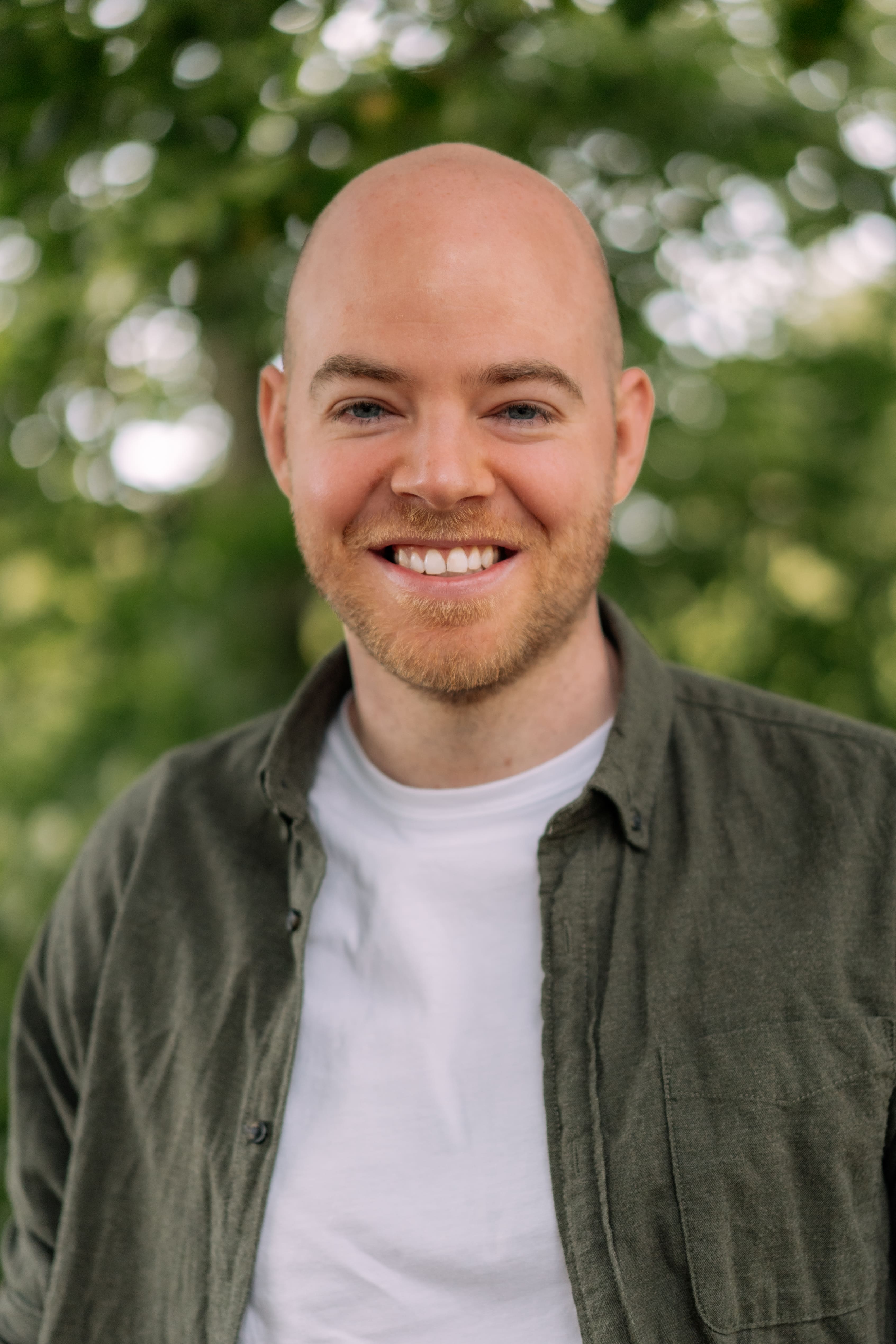 Simon Knudsen smiling outdoors